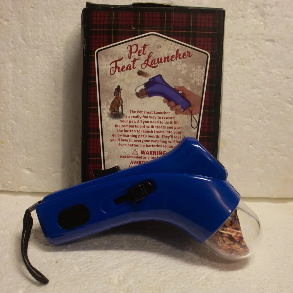 The Original Workshop Pet/Dog Treat Launcher Pet Reward Toy New Never Used